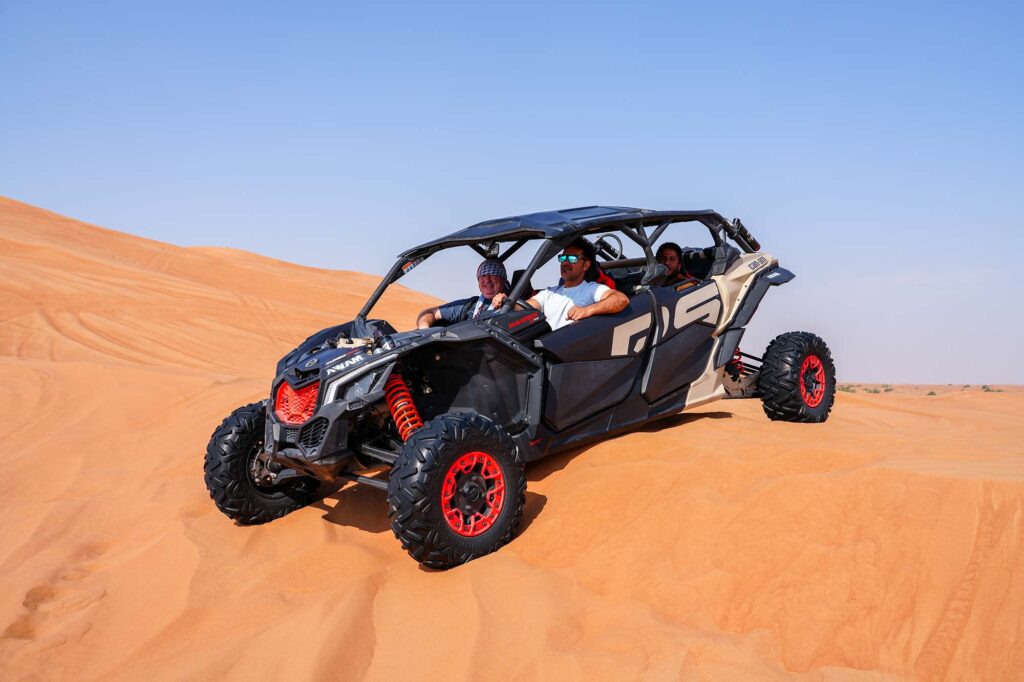 Guided quad safari route through Lahbab red dunes
