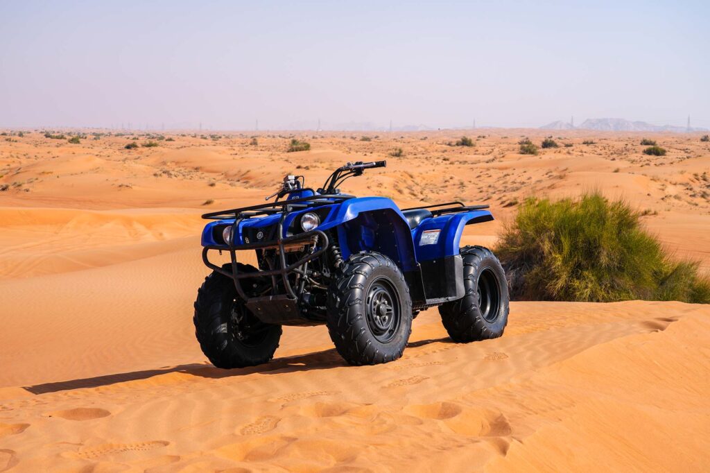 Quad bike adventure with panoramic desert view Dubai