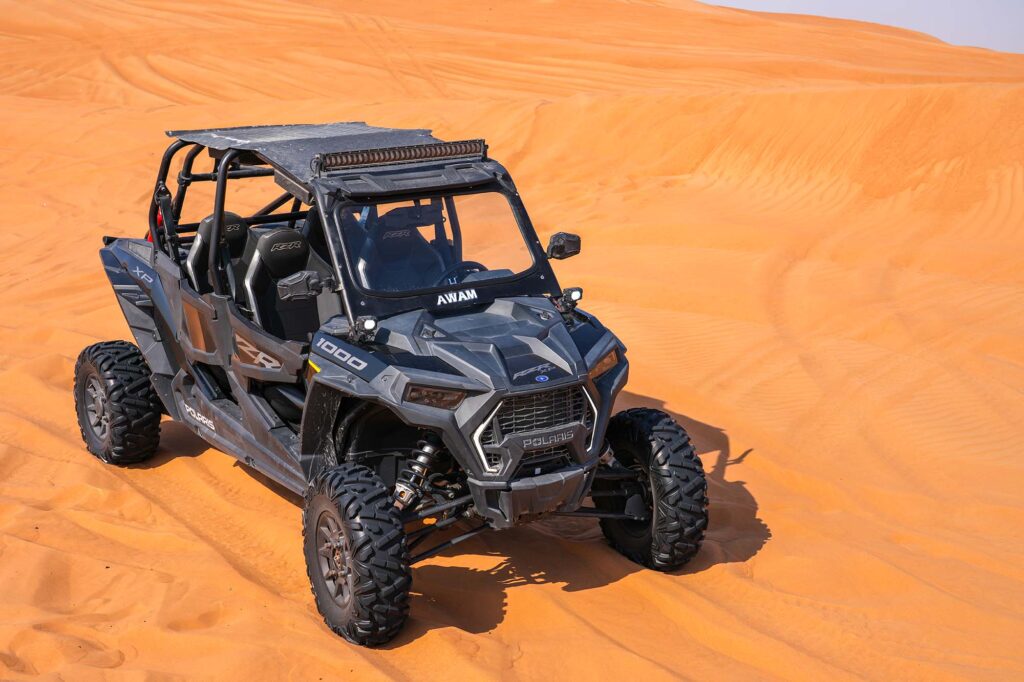 Polaris buggy adventure with wide desert landscape Dubai